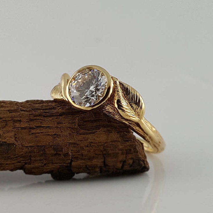 Round 1ct Moissanite Engagement Ring: Hand-sculpted Leaf Setting in Solid Gold - DV Jewelry Designs #